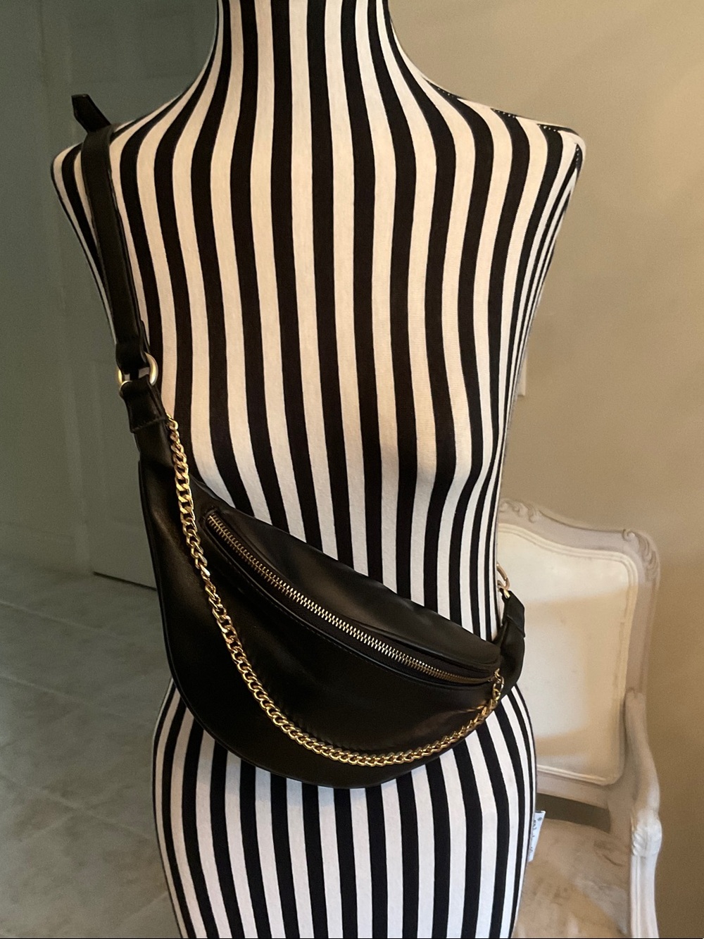 Black Leather Crossbody Belt Bag with Gold Chain Accent